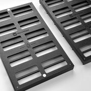 Angled view of black Kallax shelf inserts for A4 paper storage boxes